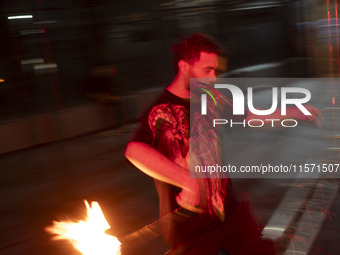 A young Iranian man performs with fire at Adrenaline Park in Tehran, Iran, on September 13, 2024. Adrenaline Park is founded by Amir Badri,...