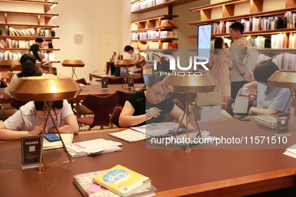 People visit TSUTAYA BOOKS in Xi'an, China, on September 13, 2024. On September 9, Xi'an TSUTAYA BOOKS issues a notice of closure and will c...