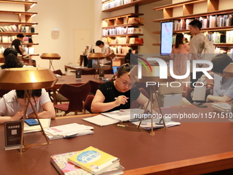 People visit TSUTAYA BOOKS in Xi'an, China, on September 13, 2024. On September 9, Xi'an TSUTAYA BOOKS issues a notice of closure and will c...