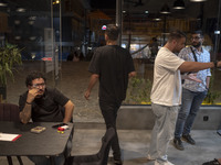 Iranian youths sit at a cafe at Adrenaline Park in Tehran, Iran, on September 13, 2024. Amir Badri, an Iranian stuntman and award winner of...