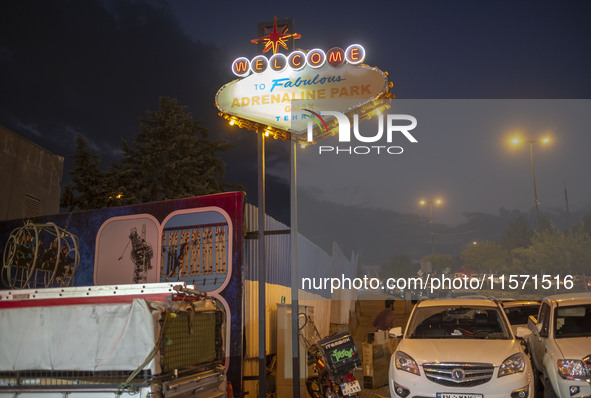 Adrenaline Park's sign is pictured at its main entrance in Tehran, Iran, on September 13, 2024. Adrenaline Park is founded by Amir Badri, an...