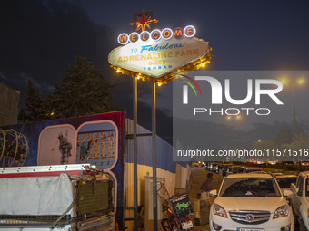 Adrenaline Park's sign is pictured at its main entrance in Tehran, Iran, on September 13, 2024. Adrenaline Park is founded by Amir Badri, an...