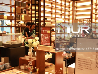 People visit TSUTAYA BOOKS in Xi'an, China, on September 13, 2024. On September 9, Xi'an TSUTAYA BOOKS issues a notice of closure and will c...