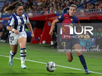 Patri Guijarro and Nerea Eizaguirre play during the match between FC Barcelona Women and Real Sociedad Women, corresponding to week 2 of the...