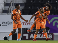 Kenji Joel (C) of Umm Salal SC celebrates after scoring a goal during the Ooredoo Qatar Stars League 24/25 match between Al-Sadd SC and Umm...