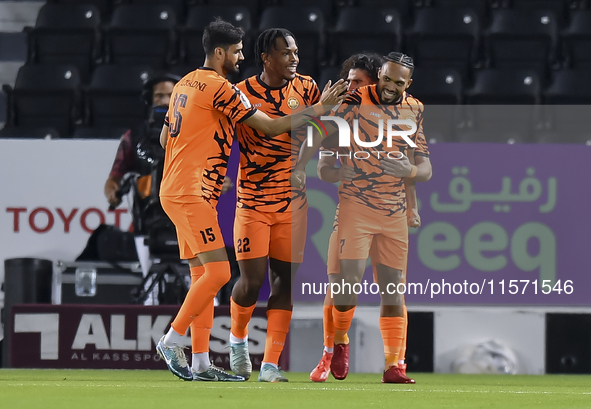 Kenji Joel (R) of Umm Salal SC celebrates after scoring a goal during the Ooredoo Qatar Stars League 24/25 match between Al-Sadd SC and Umm...