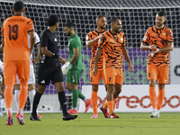 Antonio Mance (R) of Umm Salal SC celebrates after scoring a goal during the Ooredoo Qatar Stars League 24/25 match between Al-Sadd SC and U...