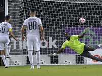 Hasan Khalid Alhaydos of Al Sadd SC takes a penalty to score a goal during the Ooredoo Qatar Stars League 24/25 match between Al-Sadd SC and...