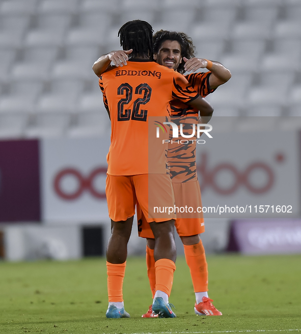 Edidiong Nigerian (L) of Umm Salal SC celebrates after scoring a goal during the Ooredoo Qatar Stars League 24/25 match between Al-Sadd SC a...