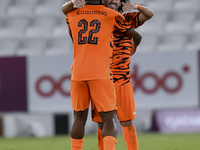 Edidiong Nigerian (L) of Umm Salal SC celebrates after scoring a goal during the Ooredoo Qatar Stars League 24/25 match between Al-Sadd SC a...