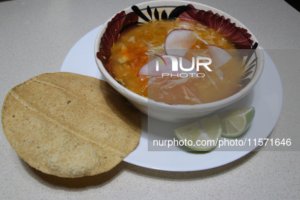 A plate of Pozole is seen on the eve of the national holidays in Mexico City, Mexico, on September 12, 2024. This dish is one of the most re...