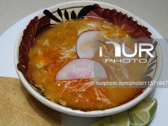 A plate of Pozole is seen on the eve of the national holidays in Mexico City, Mexico, on September 12, 2024. This dish is one of the most re...