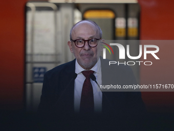 Guillermo Calderon, director of the Metro Collective Transport System, accompanies Marti Batres, head of the Mexico City government, in Mexi...