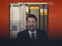 Marti Batres, head of the Mexico City government, with authorities of the Metro Collective Transport System of the capital, during the reope...