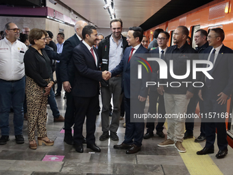 At the center, Marti Batres (left), head of the Mexico City government, and Zhang Run (right), His Excellency Ambassador of the People's Rep...