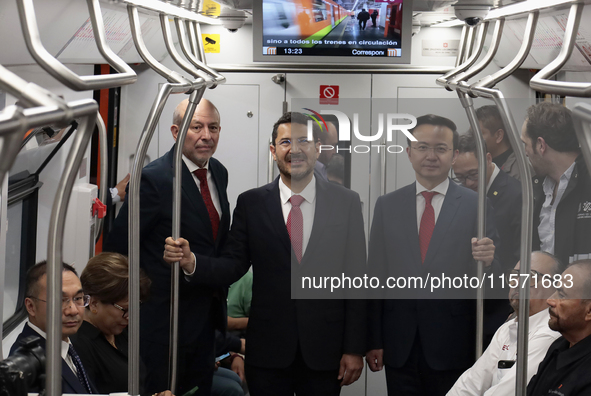 From left to right, Guillermo Calderon, director of the Metro Collective Transport System; Marti Batres, head of the Mexico City government;...