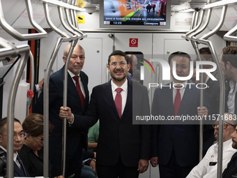 From left to right, Guillermo Calderon, director of the Metro Collective Transport System; Marti Batres, head of the Mexico City government;...