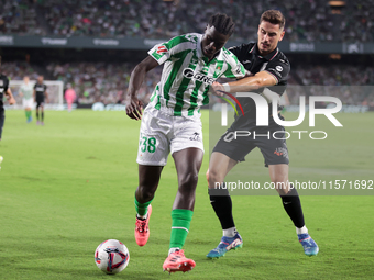 Assane Diao of Real Betis battles for the ball during the La Liga EA Sports match between Real Betis and CD Leganes at Benito Villamarin in...