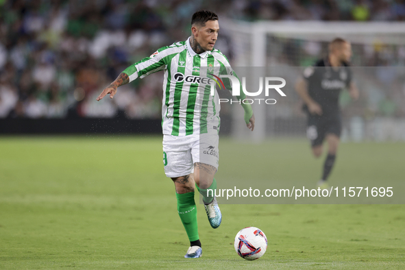 Chimy Avila of Real Betis runs with the ball during the La Liga EA Sports match between Real Betis and CD Leganes at Benito Villamarin in Se...