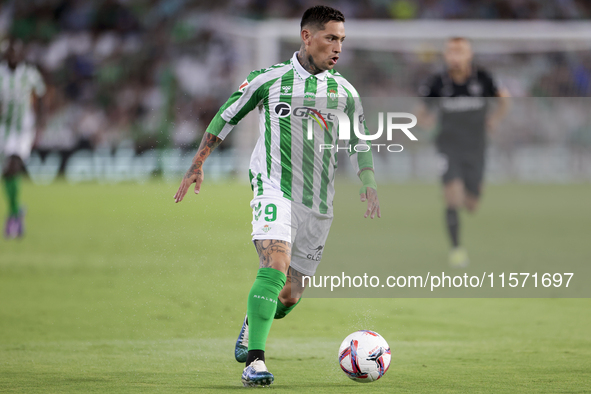 Chimy Avila of Real Betis runs with the ball during the La Liga EA Sports match between Real Betis and CD Leganes at Benito Villamarin in Se...