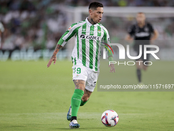 Chimy Avila of Real Betis runs with the ball during the La Liga EA Sports match between Real Betis and CD Leganes at Benito Villamarin in Se...