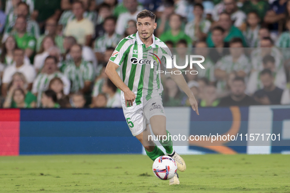 Romain Perraud of Real Betis controls the ball during the La Liga EA Sports match between Real Betis and CD Leganes at Benito Villamarin in...