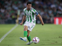 Pablo Fornals of Real Betis passes the ball during the La Liga EA Sports match between Real Betis and CD Leganes at Benito Villamarin in Sev...