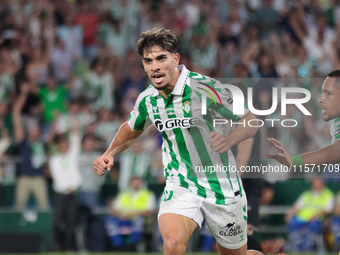 Ez Abde of Real Betis celebrates scoring his team's first goal with his teammates during the La Liga EA Sports match between Real Betis and...