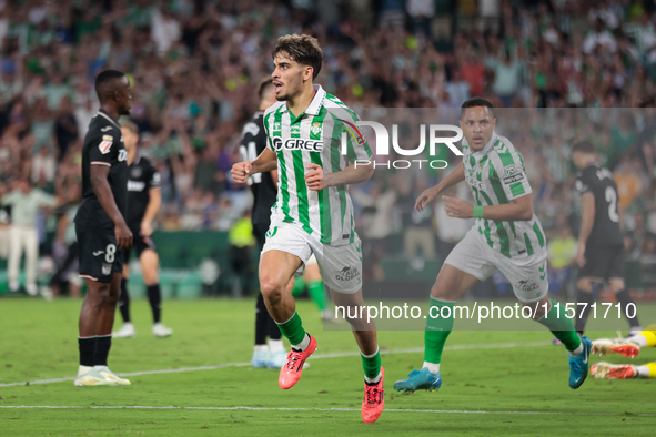 Ez Abde of Real Betis celebrates scoring his team's first goal with his teammates during the La Liga EA Sports match between Real Betis and...