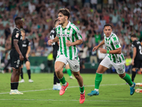 Ez Abde of Real Betis celebrates scoring his team's first goal with his teammates during the La Liga EA Sports match between Real Betis and...