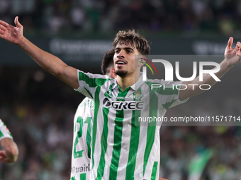 Ez Abde of Real Betis celebrates scoring his team's first goal with his teammates during the La Liga EA Sports match between Real Betis and...