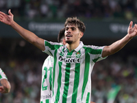 Ez Abde of Real Betis celebrates scoring his team's first goal with his teammates during the La Liga EA Sports match between Real Betis and...