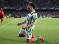 Ez Abde of Real Betis celebrates scoring his team's first goal with his teammates during the La Liga EA Sports match between Real Betis and...