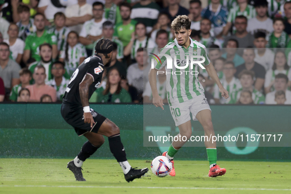 Ez Abde of Real Betis runs with the ball during the La Liga EA Sports match between Real Betis and CD Leganes at Benito Villamarin in Sevill...