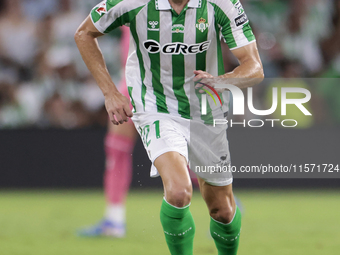 Marc Roca of Real Betis runs with the ball during the La Liga EA Sports match between Real Betis and CD Leganes at Benito Villamarin in Sevi...