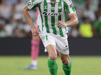 Marc Roca of Real Betis runs with the ball during the La Liga EA Sports match between Real Betis and CD Leganes at Benito Villamarin in Sevi...