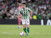 Marc Roca of Real Betis runs with the ball during the La Liga EA Sports match between Real Betis and CD Leganes at Benito Villamarin in Sevi...