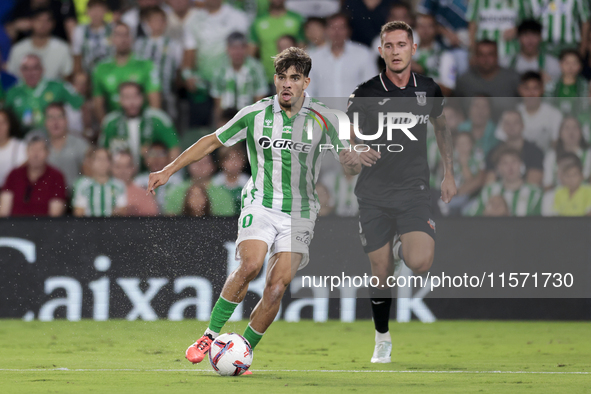 Ez Abde of Real Betis runs with the ball during the La Liga EA Sports match between Real Betis and CD Leganes at Benito Villamarin in Sevill...