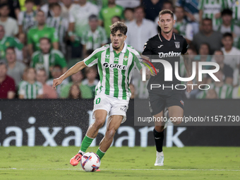 Ez Abde of Real Betis runs with the ball during the La Liga EA Sports match between Real Betis and CD Leganes at Benito Villamarin in Sevill...