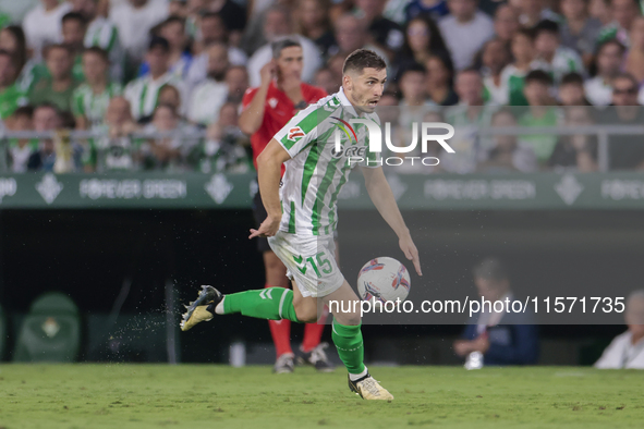 Romain Perraud of Real Betis runs with the ball during the La Liga EA Sports match between Real Betis and CD Leganes at Benito Villamarin in...