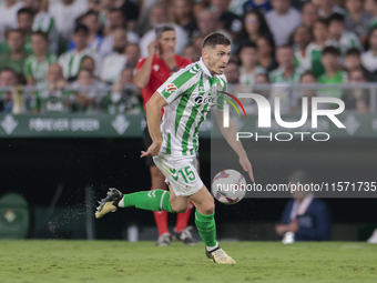 Romain Perraud of Real Betis runs with the ball during the La Liga EA Sports match between Real Betis and CD Leganes at Benito Villamarin in...