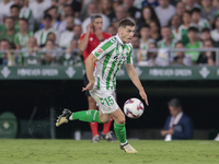 Romain Perraud of Real Betis runs with the ball during the La Liga EA Sports match between Real Betis and CD Leganes at Benito Villamarin in...