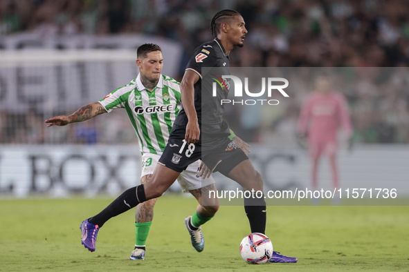 Sebastien Haller of CD Leganes passes the ball during the La Liga EA Sports match between Real Betis and CD Leganes at Benito Villamarin in...