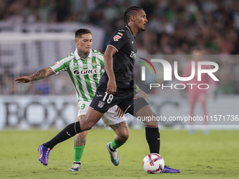 Sebastien Haller of CD Leganes passes the ball during the La Liga EA Sports match between Real Betis and CD Leganes at Benito Villamarin in...