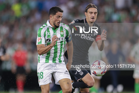 Pablo Fornals of Real Betis battles for the ball during the La Liga EA Sports match between Real Betis and CD Leganes at Benito Villamarin i...