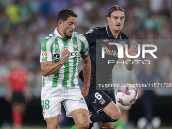 Pablo Fornals of Real Betis battles for the ball during the La Liga EA Sports match between Real Betis and CD Leganes at Benito Villamarin i...