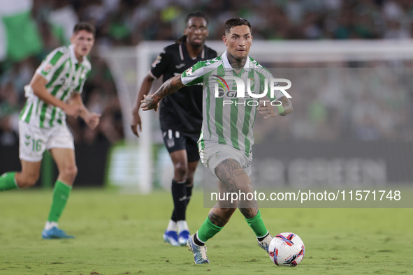 Chimy Avila of Real Betis runs with the ball during the La Liga EA Sports match between Real Betis and CD Leganes at Benito Villamarin in Se...