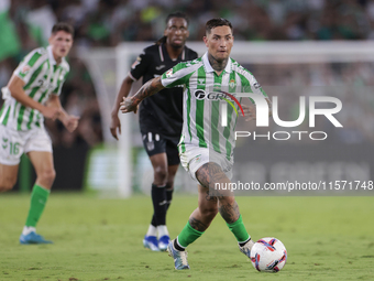 Chimy Avila of Real Betis runs with the ball during the La Liga EA Sports match between Real Betis and CD Leganes at Benito Villamarin in Se...