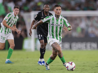 Chimy Avila of Real Betis runs with the ball during the La Liga EA Sports match between Real Betis and CD Leganes at Benito Villamarin in Se...