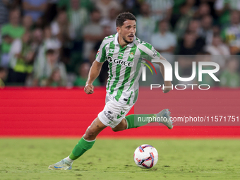 Pablo Fornals of Real Betis runs with the ball during the La Liga EA Sports match between Real Betis and CD Leganes at Benito Villamarin in...